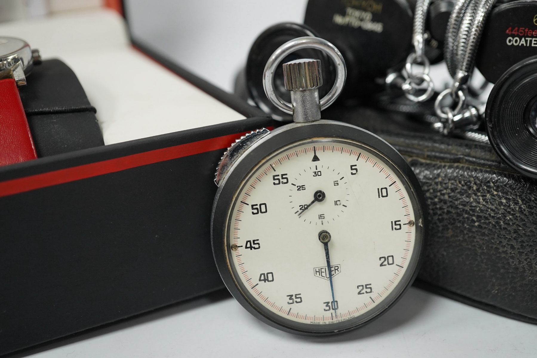 Sundry items comprising a gent's dress watch, Heuer stopwatch and opera glasses. Condition - varies